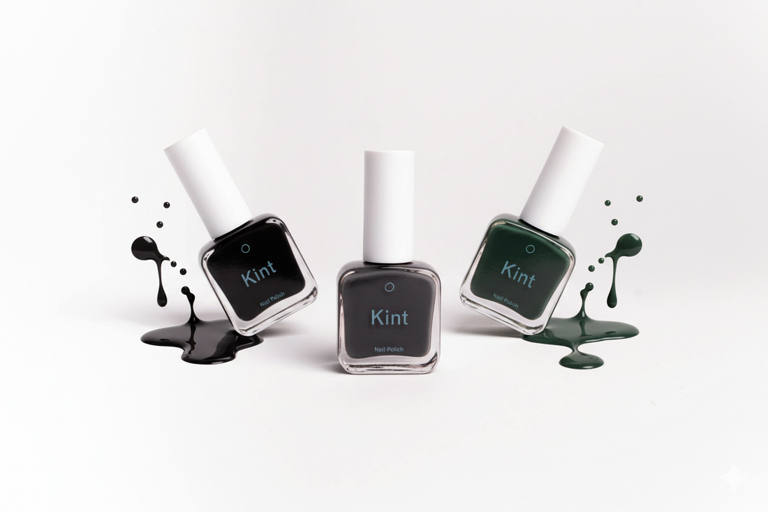 Kint Nail Polish with cool splashes of color on a blank background